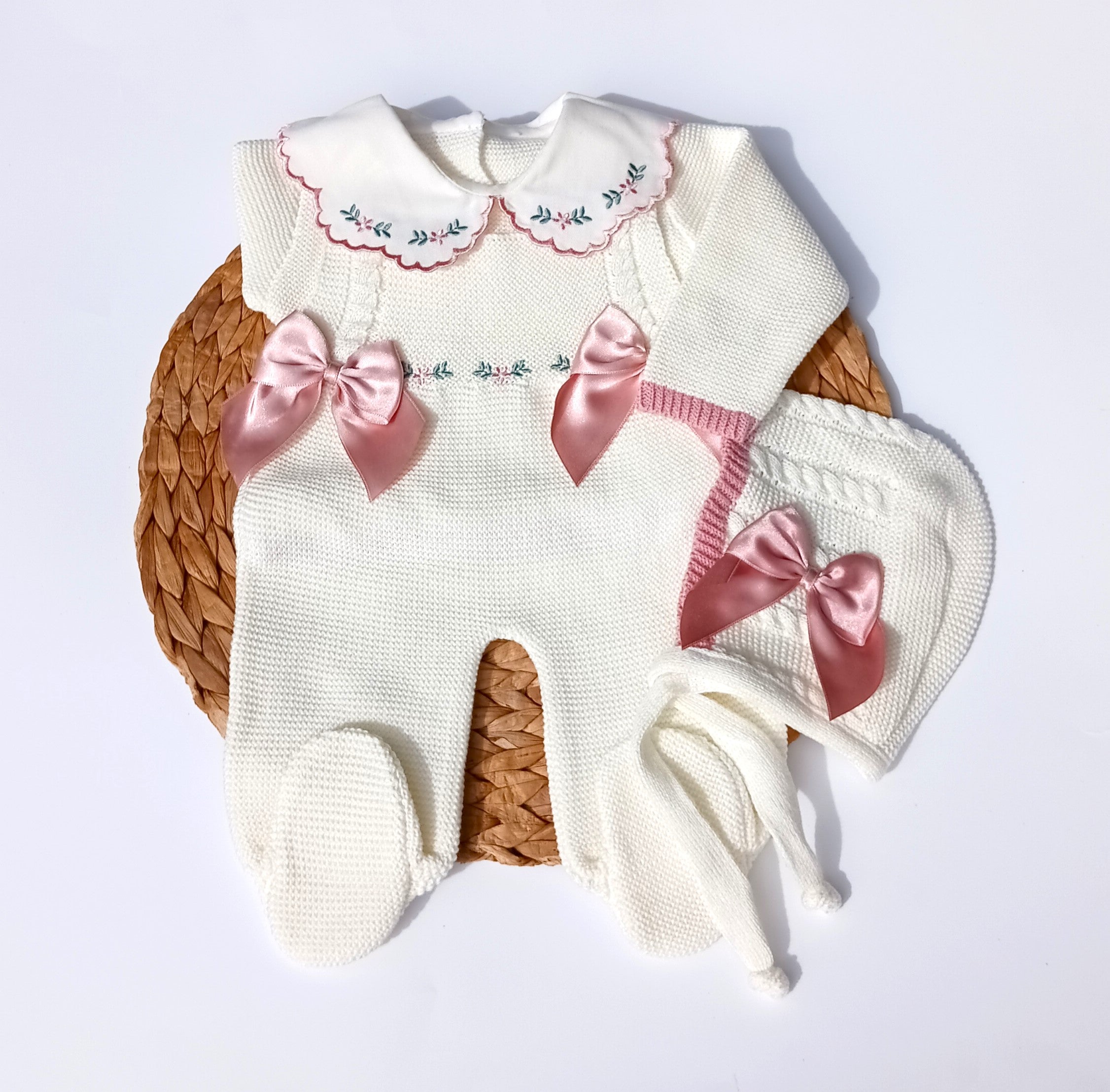 Baby outfit with embroidered details and pink bows on a white background baby girl knitted taking home outfit, newborn knit going home outfit flowers embroidery coming home outfit, baby spanish outfit