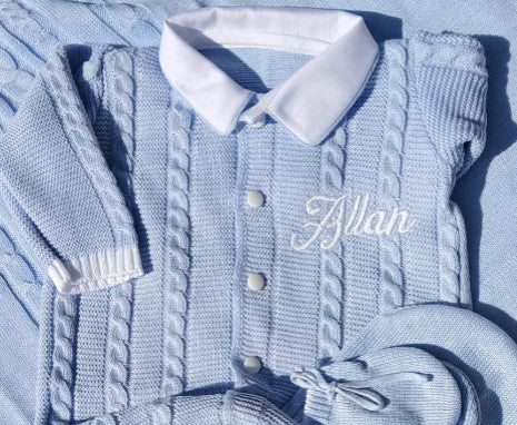 Light blue knitted cardigan with white collar and buttons, featuring the name 'Allan'.
