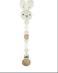 Wooden baby rattle shaped like a rabbit bunny pacifier chain clips with beads on a white background crochet bunny pacifier chain conejito chupete amigurimi