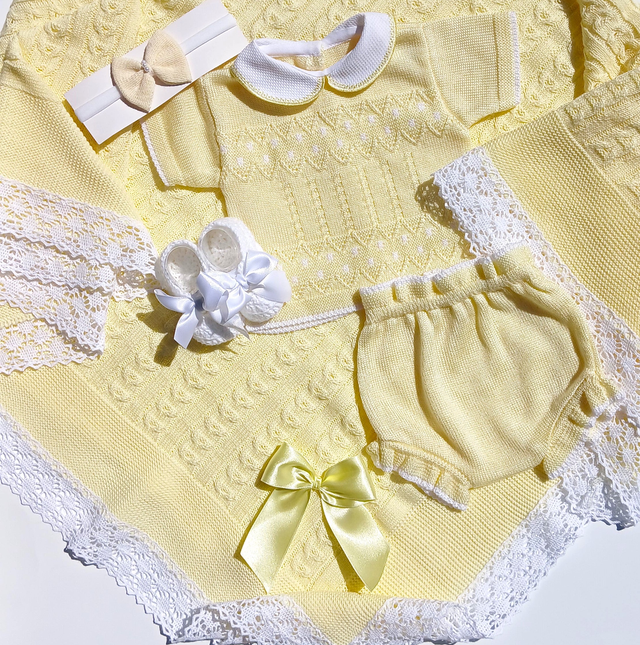 Yellow baby outfit with matching headband, bow, and bloomers on a white lace background yellow knit baby outfit, summer with diaper cover baby white bootie butterfly headband