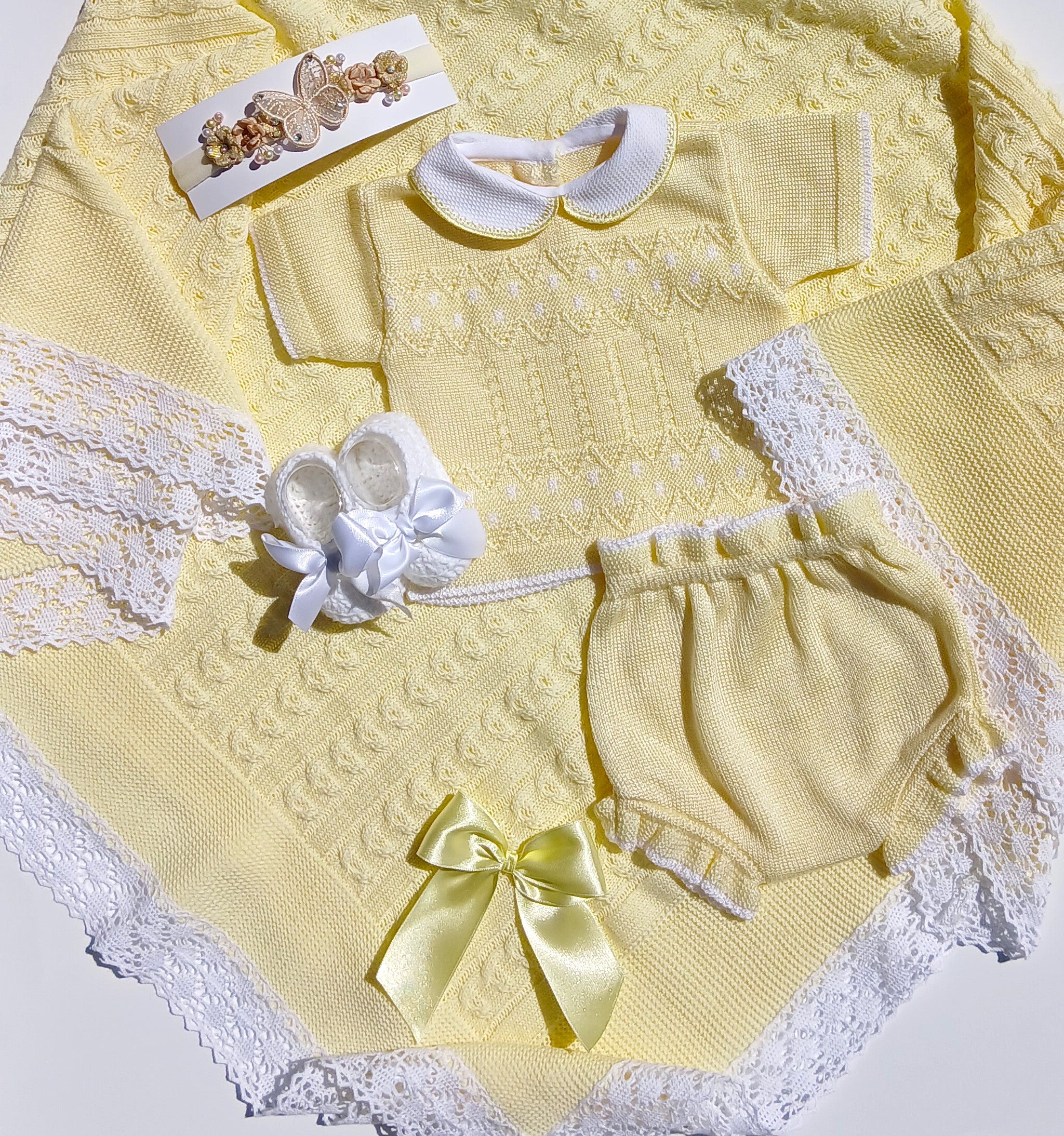 Yellow summer baby outfit with matching butterfly headband and white bootie w a bow, yellow knit baby blanket