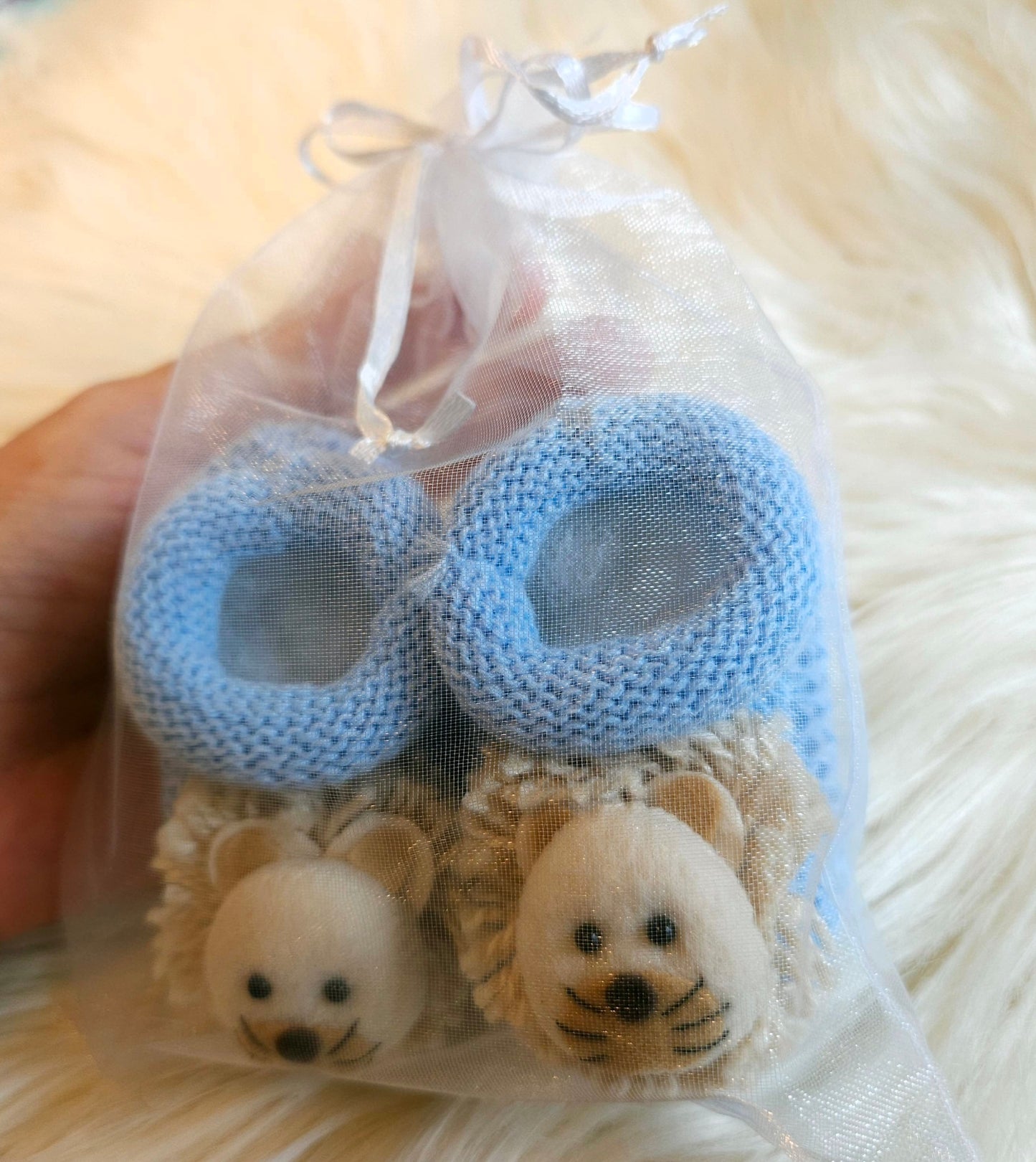 Chaussons pour bébé en tricot fait main motif lion