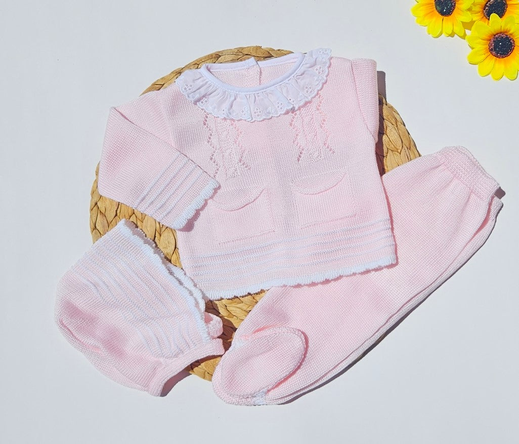 This adorable newborn outfit is a soft and sweet delight, perfect for your little princess's arrival. The gentle pink hue is calming and feminine, while the intricate white lace around the collar adds a touch of elegance and sophistication.