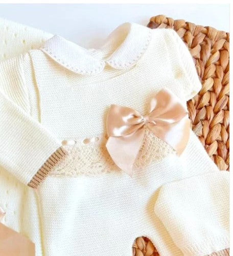 Baby girl outfit with ivory white sweater, overall pants, strike a Beige satin bow and a beige lace  on the waist 