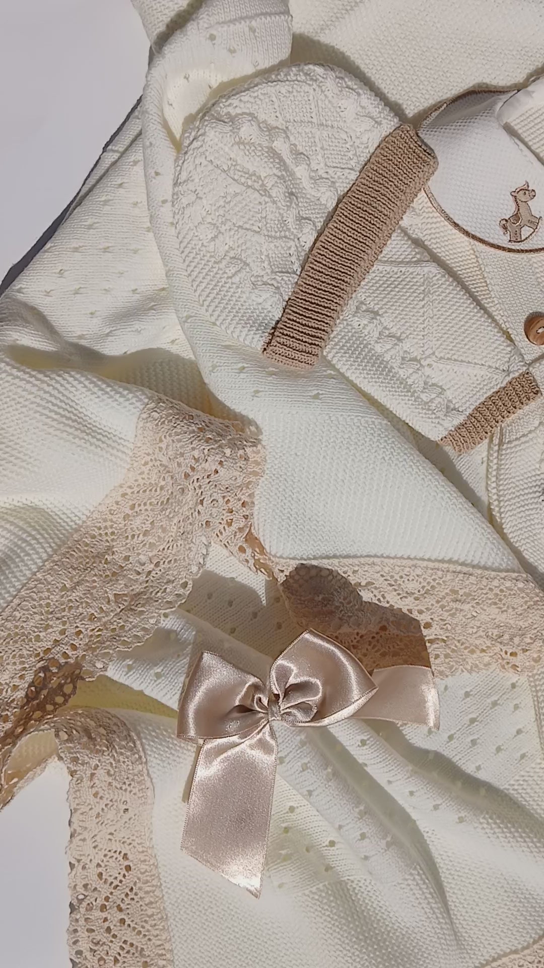 newborn knit rocking horse outfit to coming home from hospital